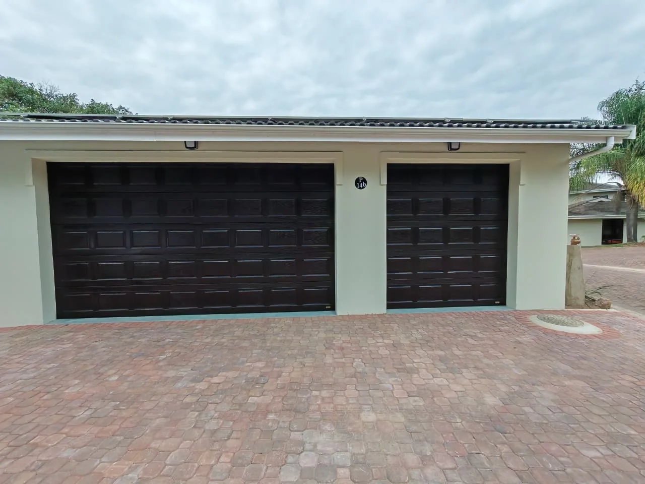 Pair of dark finished residential garage doors